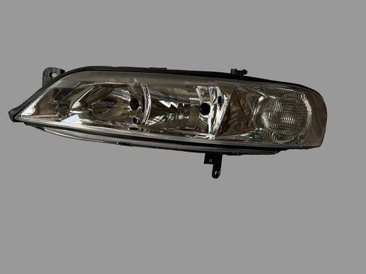 TYC 20-5750-18-2 – Phare avant gauche – Opel Vectra B (1999–2002) – Halogène H7/H7 – Électrique – Occasion