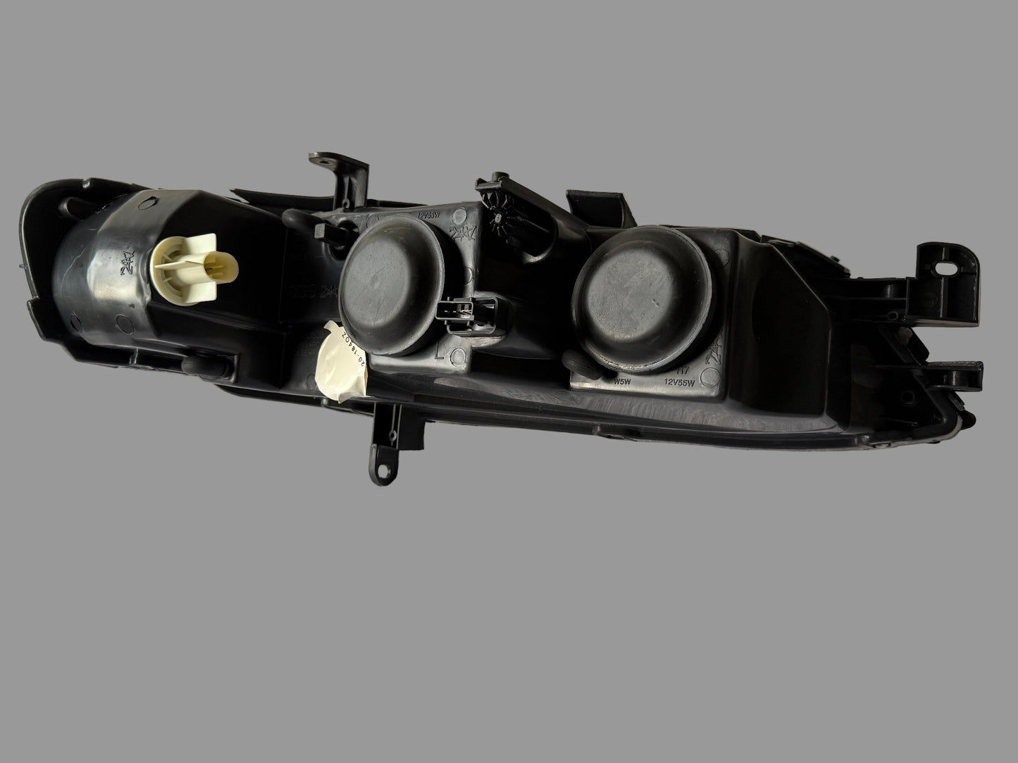 TYC 20-5750-18-2 – Phare avant gauche – Opel Vectra B (1999–2002) – Halogène H7/H7 – Électrique – Occasion