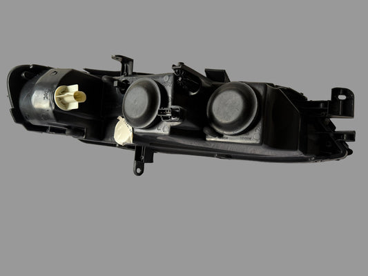 TYC 20-5750-18-2 – Phare avant gauche – Opel Vectra B (1999–2002) – Halogène H7/H7 – Électrique – Occasion