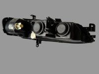 TYC 20-5750-18-2 – Phare avant gauche – Opel Vectra B (1999–2002) – Halogène H7/H7 – Électrique – Occasion