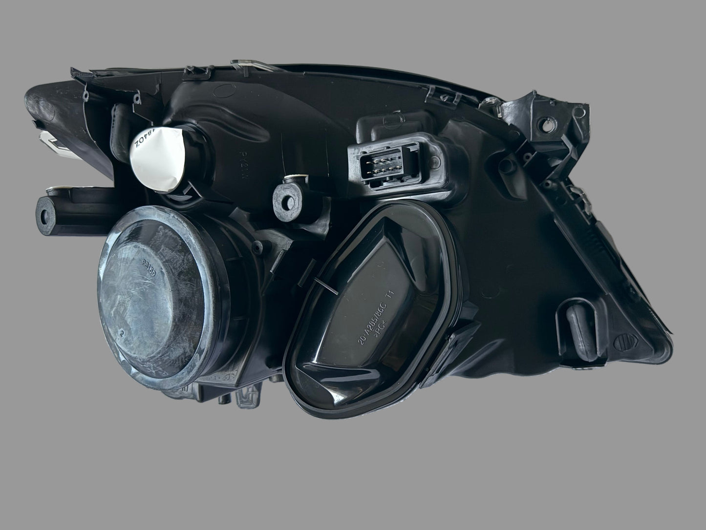 Farol dianteiro esquerdo TYC 20-0286-05-2- Opel Vectra C -2002-2005- Manual/elétrico cromado